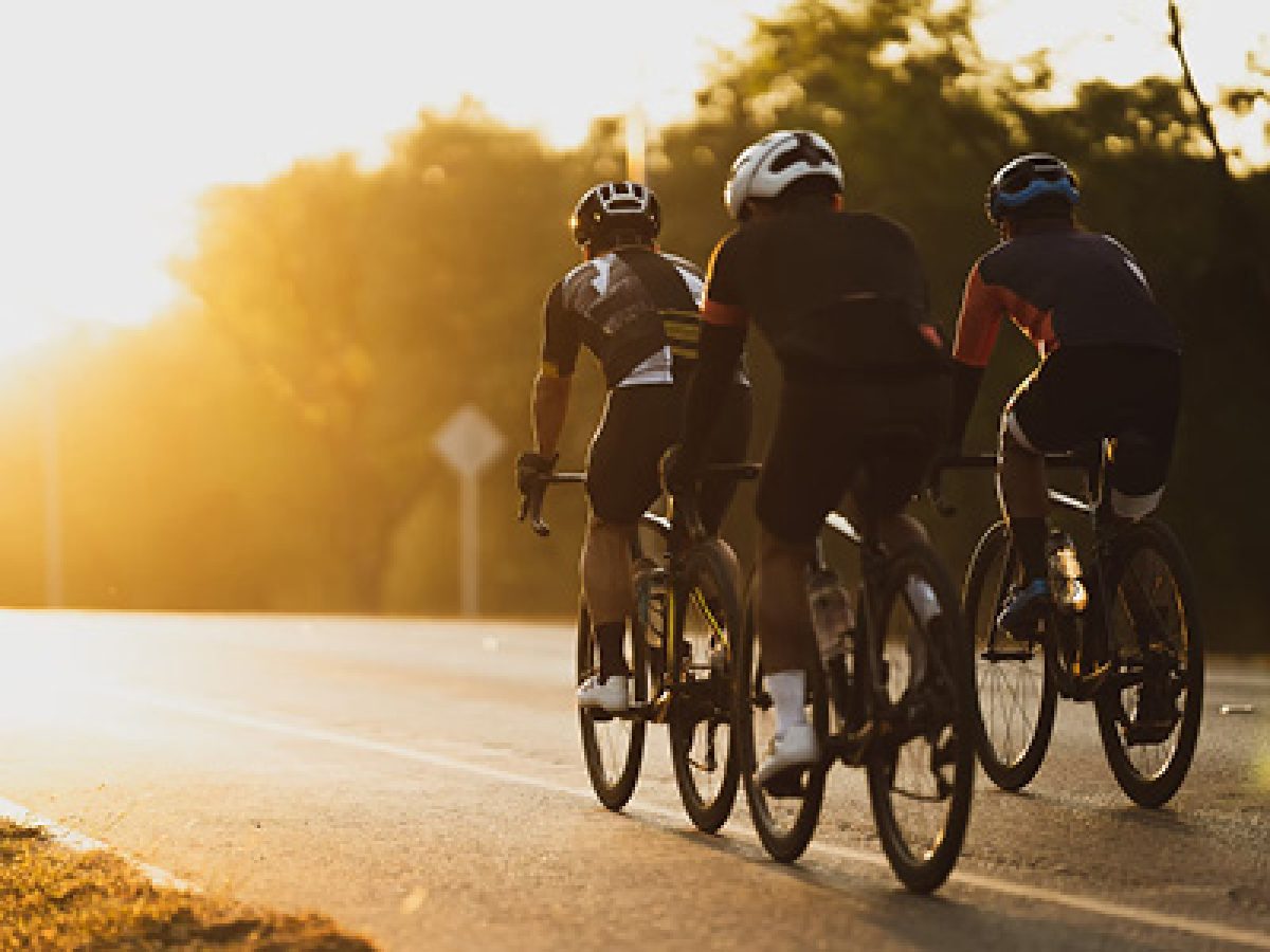 3 cyclists in on road in suffolk