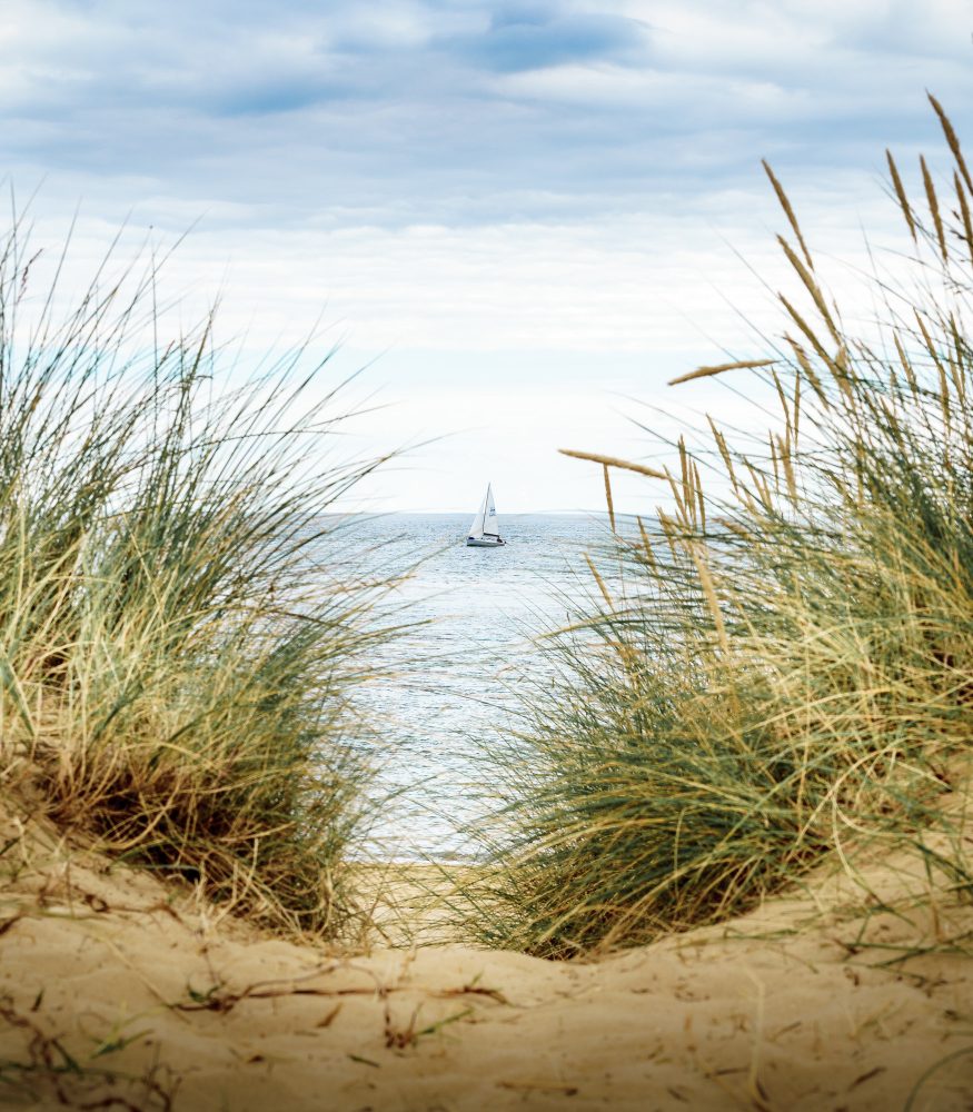 sailboat off coast of walberswick suffolk