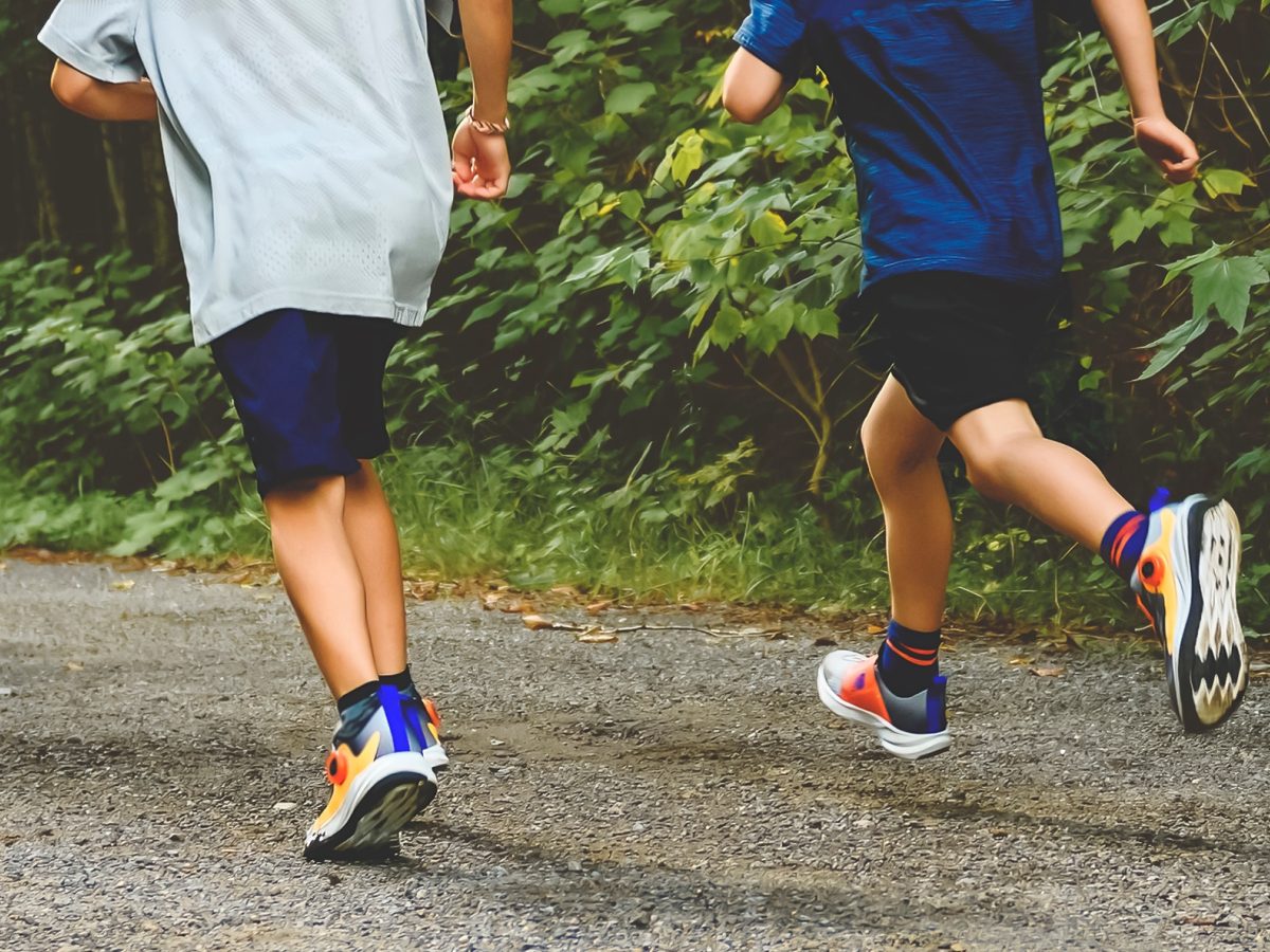 children running junior parkrun in suffolk